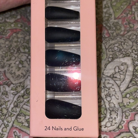 Bnib Tip Beauty brand glue-on nails. The color is black & style is long stiletto - Picture 4 of 5
